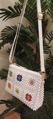 شنطة اكريلك بحزام جلد