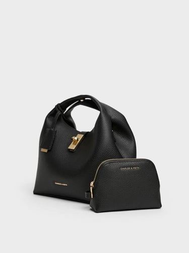 حقيبة شانس الجلدية ذات القفل الدوار-أسود