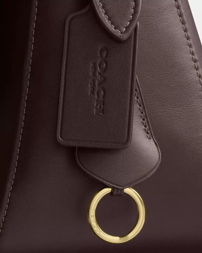 حقيبة ايتا فلاب ماركة كوتش-ألوان متعددة