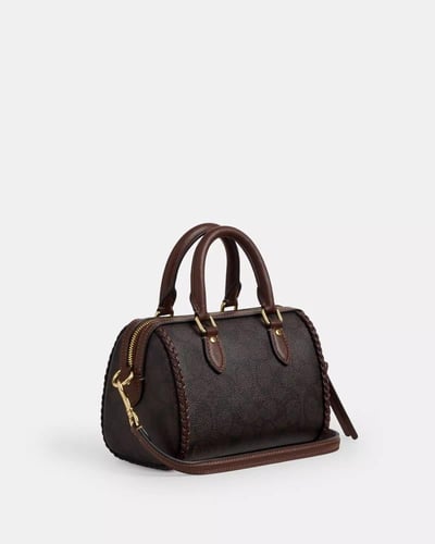 حقيبة روان كروس صغيرة من كوتش مصنوعة من قماش مميز