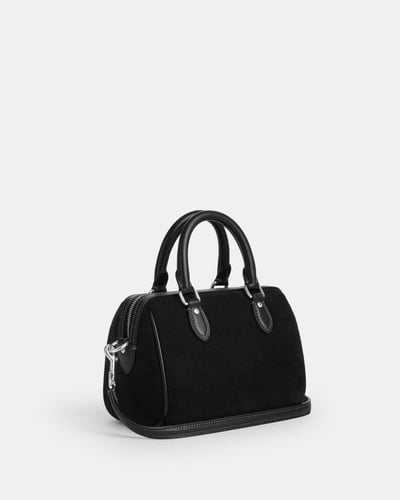 حقيبة ميني روان مع ميداليه الكرز - ماركة كوتش