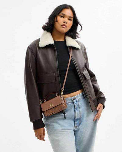 حقيبة ميني جوزي - ماركة كوتش