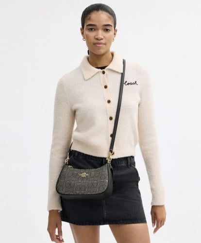 حقيبة كتف تيري - ماركة كوتش