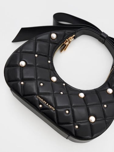 حقيبة جاني الهلالية المبطنة بمقبض فيونكة - أسود