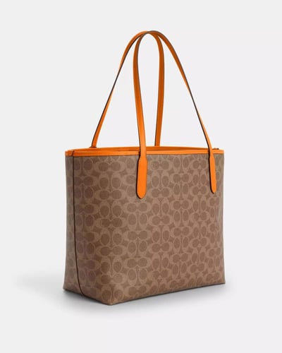 حقيبة توت سيتي مع تشارمز ماركة كوتش