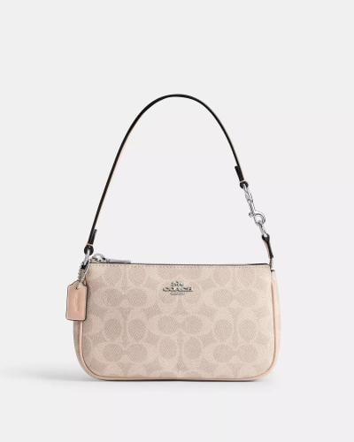 كوتش حقيبة نوليتا 19