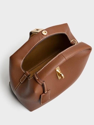 حقيبة شانس الجلدية ذات القفل الدوار-شوكولاتة