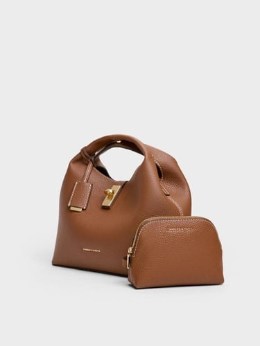 حقيبة شانس الجلدية ذات القفل الدوار-شوكولاتة