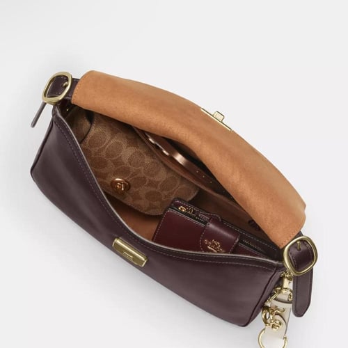 حقيبة ايتا فلاب ماركة كوتش-ألوان متعددة