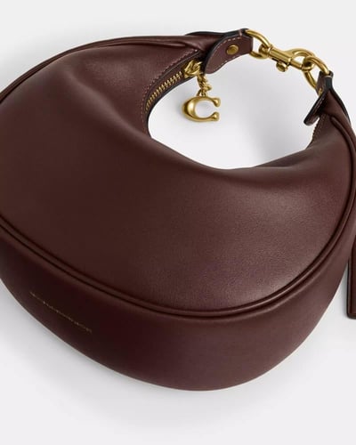 حقيبة جوني من ماركة كوتش-ألوان متعددة