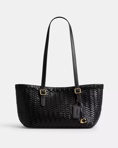 توت باق سوينق المنسوجه يدويًا من ماركة كوتش