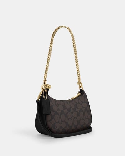 حقيبة تيري ميني كروس بودي - ماركة كوتش