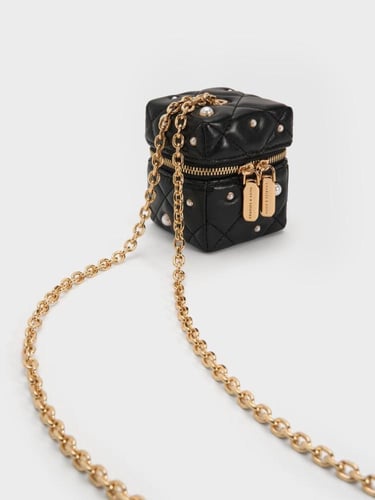 حقيبة جاني المعدنية المبطنة بمقبض سلسلة - ألوان مت...