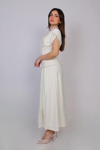 فستان ميدي أنيق بتصميم أنثوي ناعم ولمسة فاخرة تلفت...