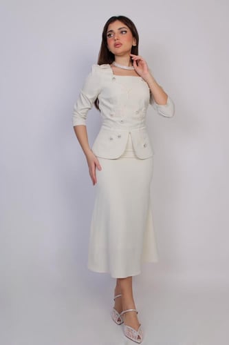 فستان نسائي أنيق باللون الفستقي المميز بتصميم راقٍ...