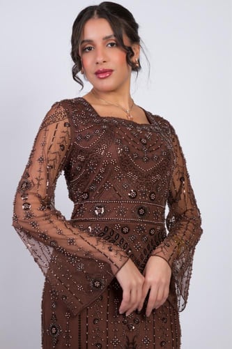 فستان سهرة "البرونز الملوكي" المزين بالكامل بالترت...