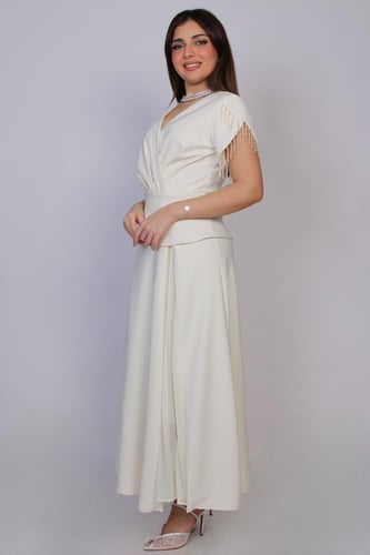 فستان ميدي أنيق بتصميم أنثوي ناعم ولمسة فاخرة تلفت...