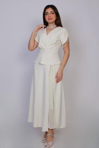 فستان ميدي أنيق بتصميم أنثوي ناعم ولمسة فاخرة تلفت...