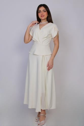 فستان ميدي أنيق بتصميم أنثوي ناعم ولمسة فاخرة تلفت...