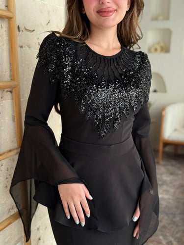 فستان قصة بيبلوم مميزة عند الخص