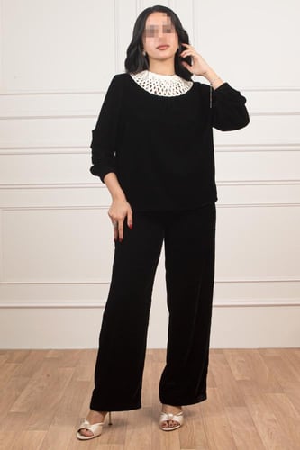 طقم أسود أنيق بياقة مزخرفة