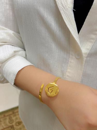 A standing bracelet plated with gold or silver