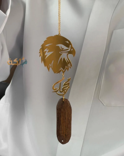 A car pendant plated with gold or silver with oud...