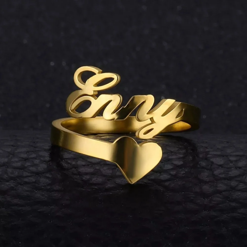A name ring connected to a heart with a very uniqu...