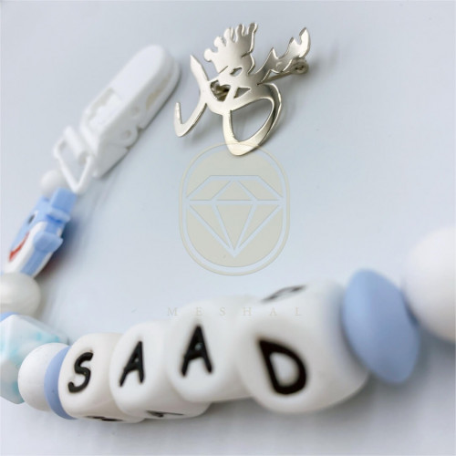 طقم بروش مطلي بالفضه مع بروش مصاصة سيلكون بالأسم ح...