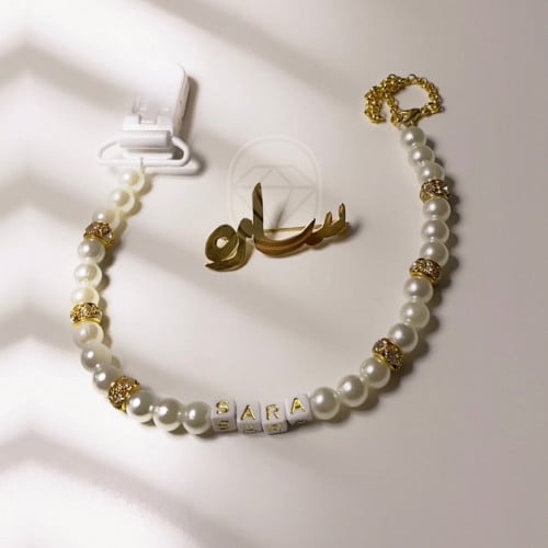 طقم بروش مطلي بالفضه مع بروش مصاصة لولو بالأسم حسب...