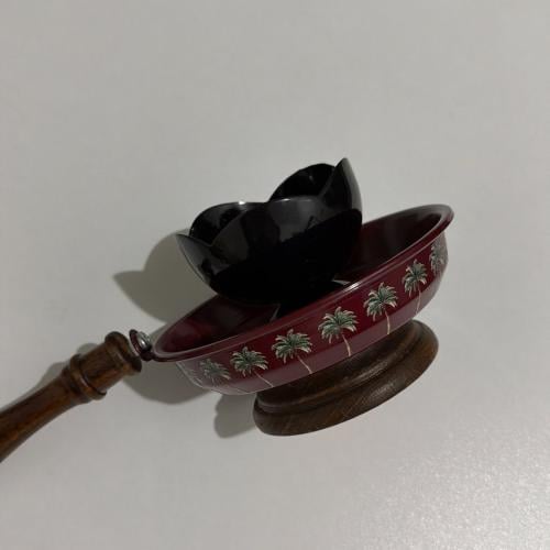 Pink palm incense burner with black