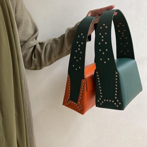 Natural leather bag orange with green