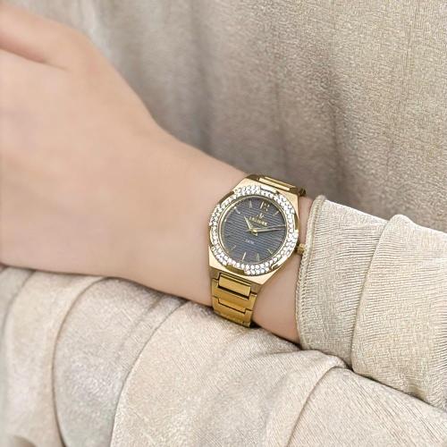 ساعة نسائية استيل بلون ذهبي اطار ذهبي ميناء رمادي