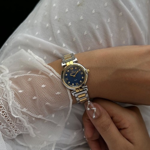 ساعة نسائية انديرا استيل بلون فضي و ذهبي ميناء أزر...