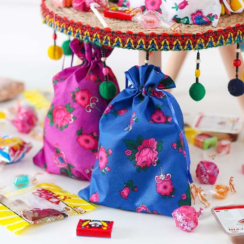 كيس توزيعات حلويات - شامل الحلويات