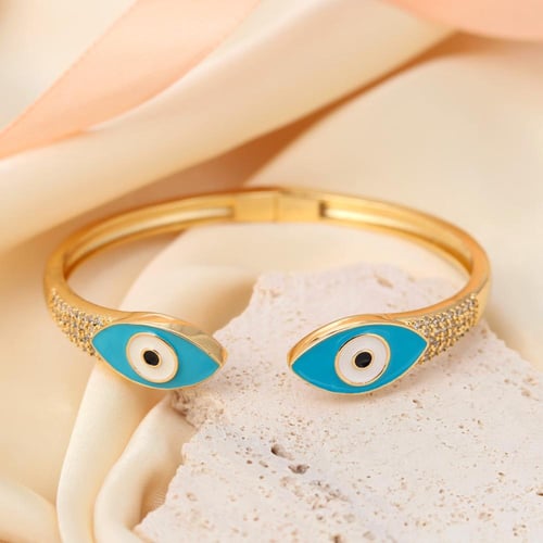 سوار مطلي بالذهب شكل عيون