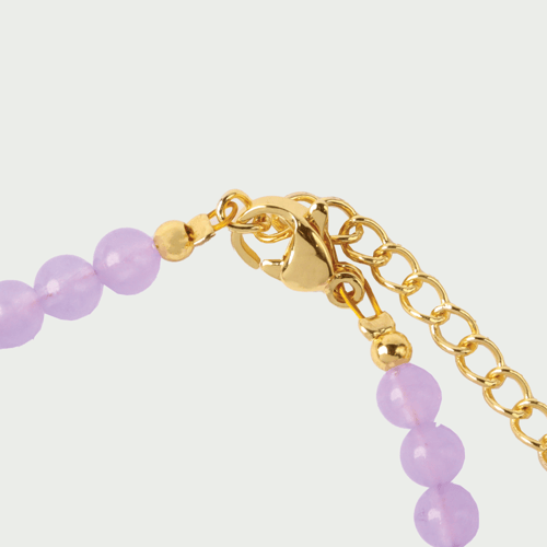 اسورة من الاحجار الطبيعية ومزينة بحبات اللؤلؤ المز...