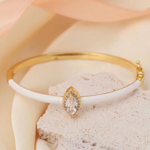سوار مطلي بالذهب مزين بالكريستال المتوهج شكل دمعة