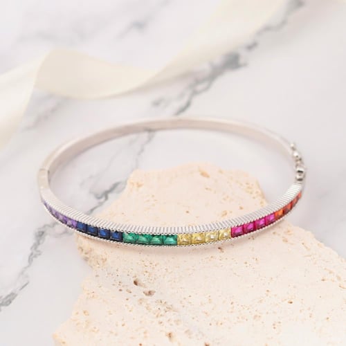 سوار مطلي بالذهب مزين بالكريستال المتوهج