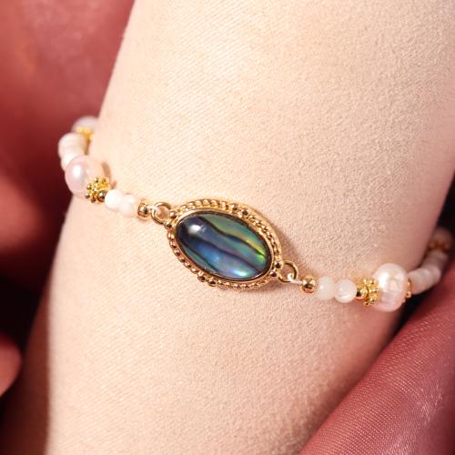 سوار من الصدف الطبيعي بتعليقة مطلية بالذهب وصدف طب...