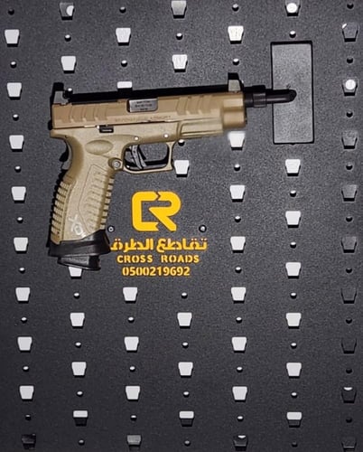 قاعدة لحمل المسدس