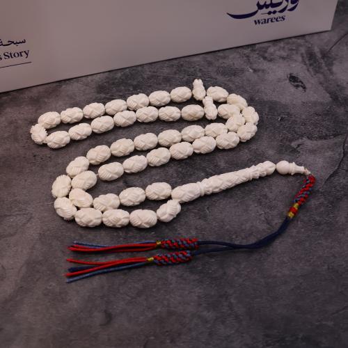 عظم جمل منقوش كركوشة