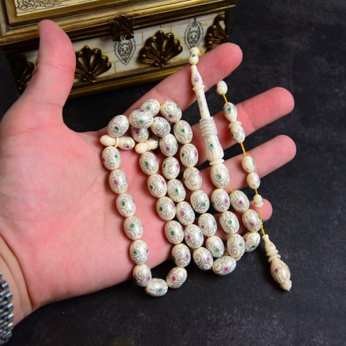 قطعة فاخرة من عاج الفيل المطعم بالفضة