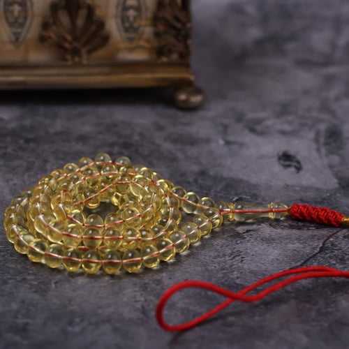 سبحة كهرمان طبيعي شفاف