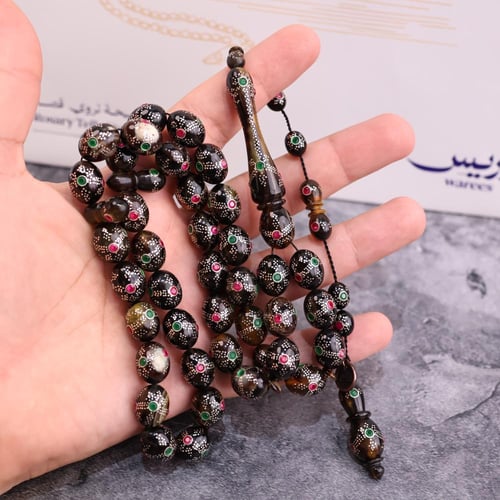 ظهر سلحفاة فضة و زمرد وياقوت