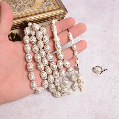 قطعة فاخرة من عاج الفيل المطعم بالفضة