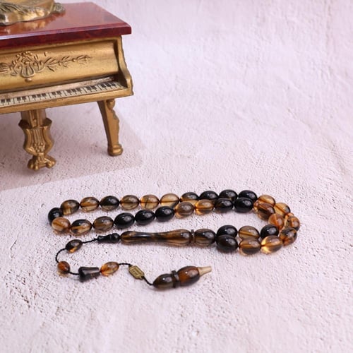 فاتوران لون العنبر والزمرد