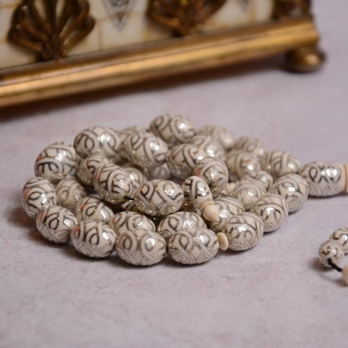 قطعة فاخرة من عاج الفيل المطعم بالفضة