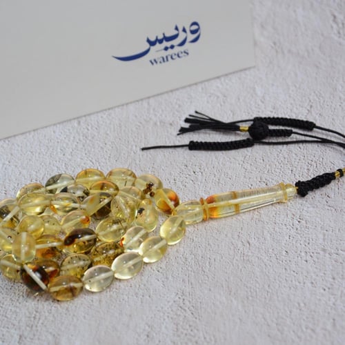 سبحة كهرمان شفاف شوائب