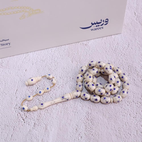 قطعة فاخرة من عاج الفيل مع حجر اللازورد